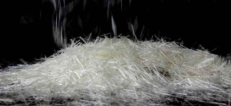 Mascot’s alkali resistant glass fibre: cut to size and weighed in each batch to ensure quality